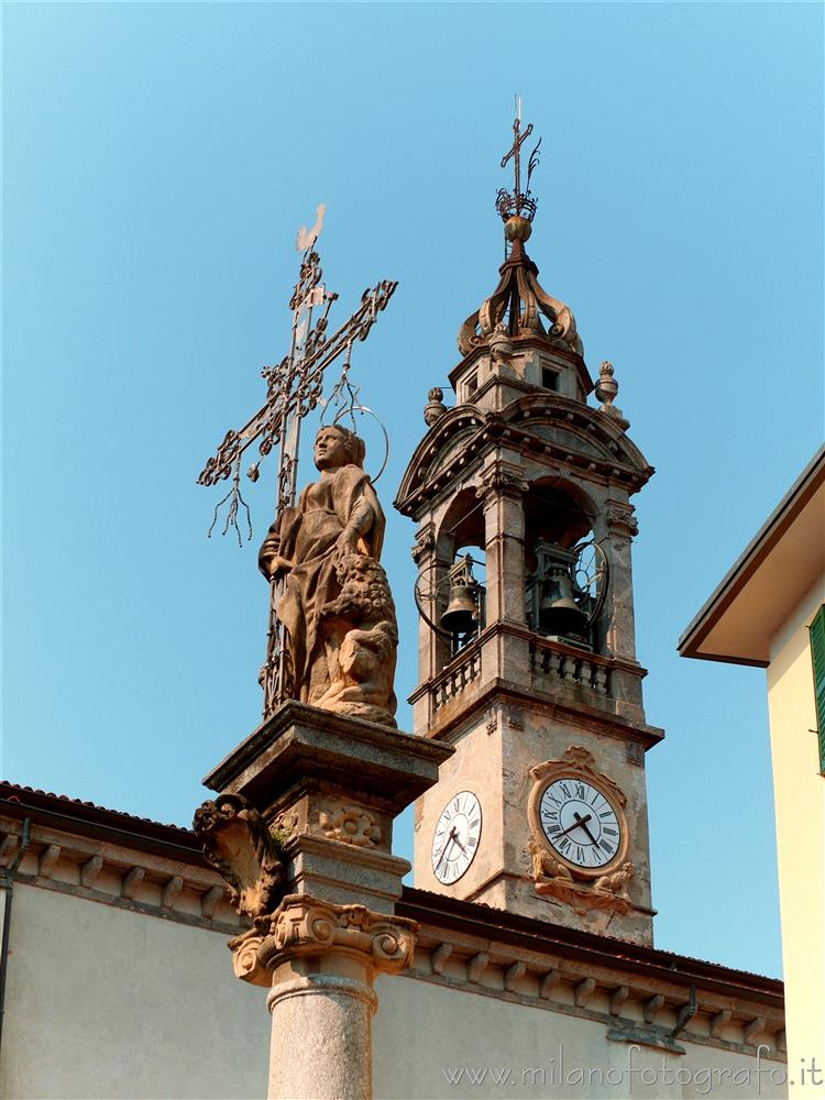 Oggiono (Lecco, Italy) - Column of Sant'Eufemia and bell tower of the Church of Sant'Eufemia